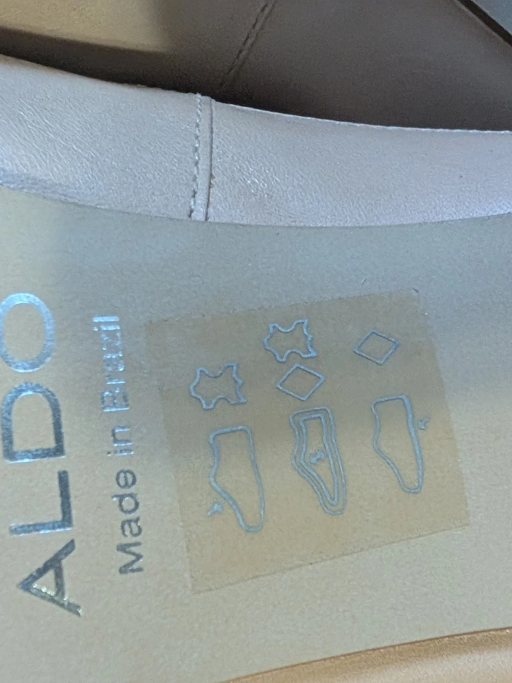 ALDO Women’s Pointed Toe Flats in White and Tan